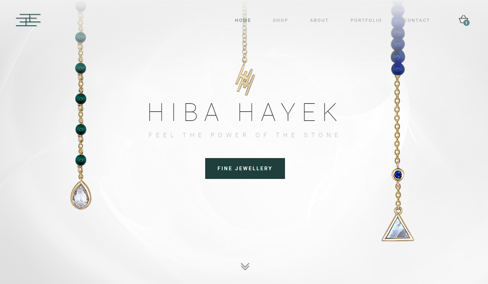 Jewelry store website showing jeweled gold chains hanging from the top of screen, the text “Hiba Hayek: Feel the power of the stone,” and a CTA button saying “Fine jewellery.”